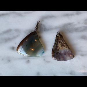 Two Polished Stone Pendants